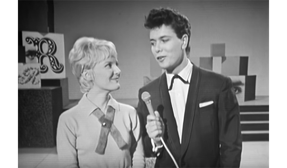 With Cliff Richard